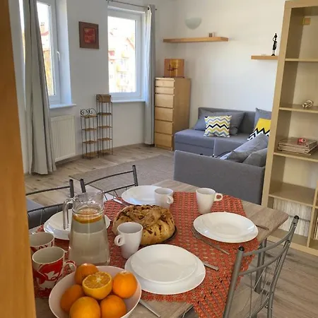 Pomarańczowy - Kawalerka W śródmieściu *